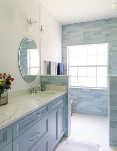 remodeling for retirement master bath with blue vanity and walk-in shower – Hughes Bath