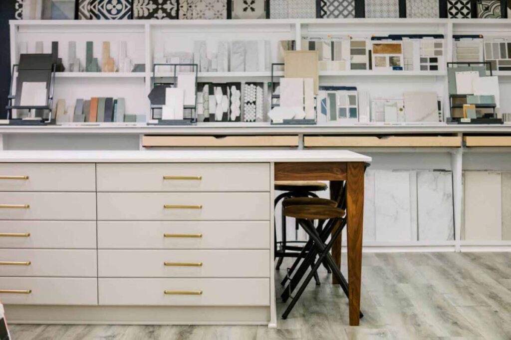 inside the design showroom with lots of samples on the walls